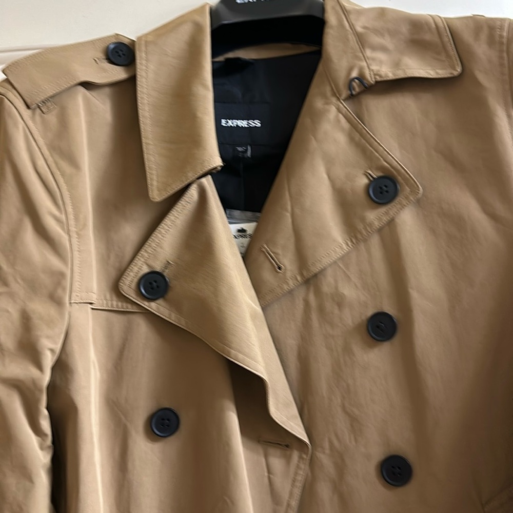 Medium size express trench coat. Never been worn